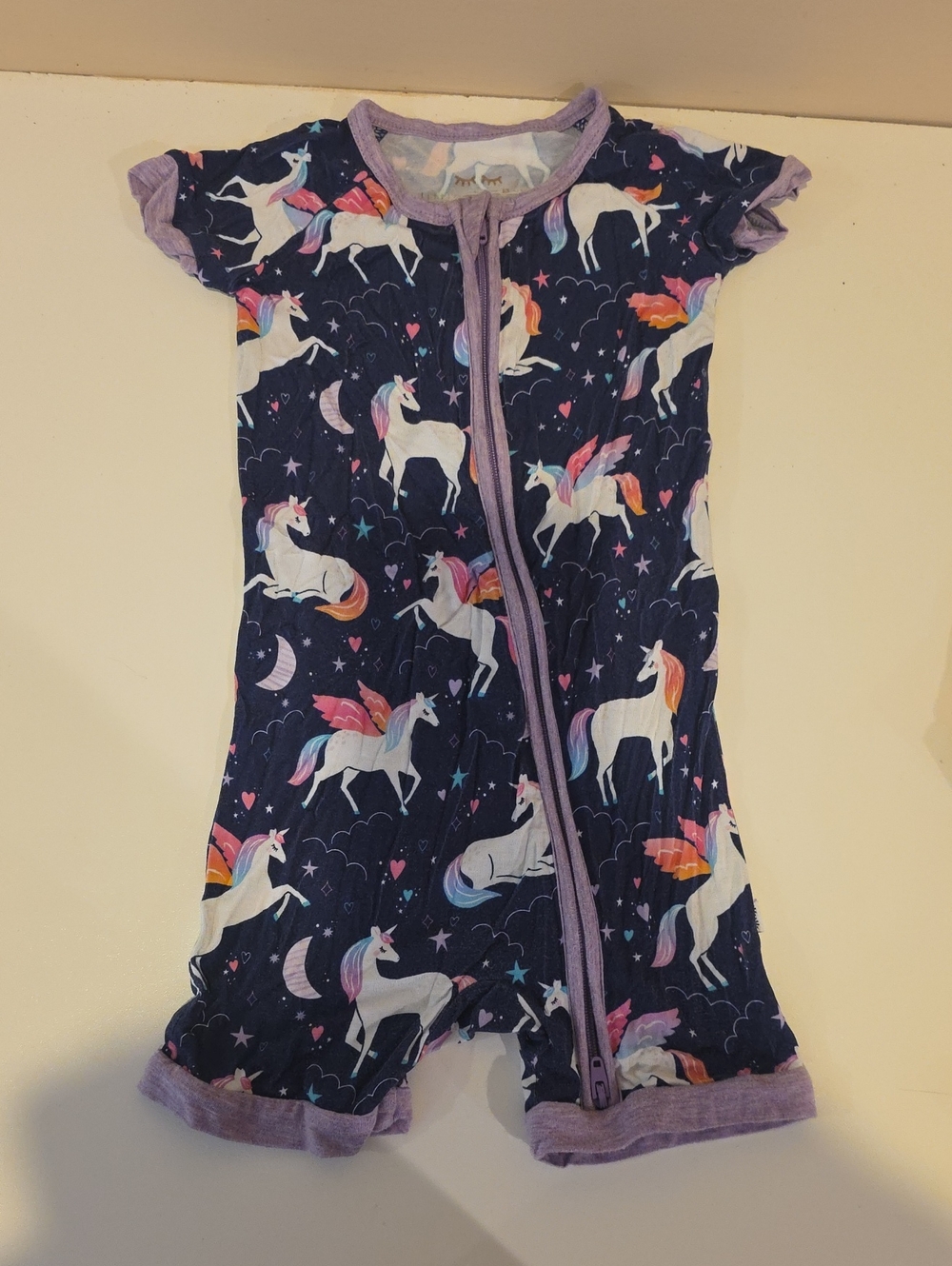 Little Sleepies Navy Romper with Lavender Trim and Unicorn Print